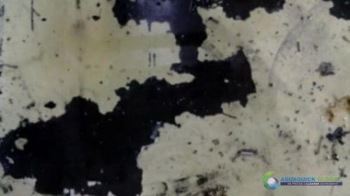 Oil and Grease stained components cleaned with AQUAQUICK 2000 74